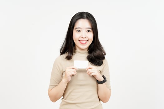 Holding Blank Bank Card Or Credit Card Of Beautiful Asian Woman Isolated On White Background photo