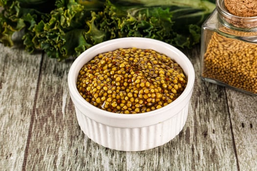 Mustard sauce with seeds in the bowl photo