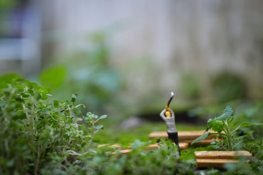 A diorama is a three-dimensional miniature depicting a particular scene or scene. A diorama depicting someone cutting wood. photo
