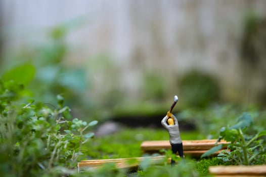A diorama is a three-dimensional miniature depicting a particular scene or scene. A diorama depicting someone cutting wood. photo