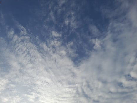 Blue sky background and white clouds photo