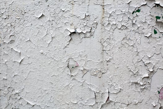 old gray cracked paint wall background photo