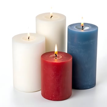 White, blue and red candle isolated on white background photo