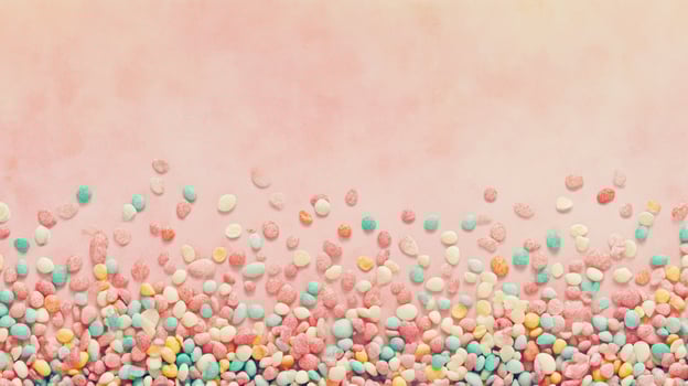 A pink background with many colorful balloons photo