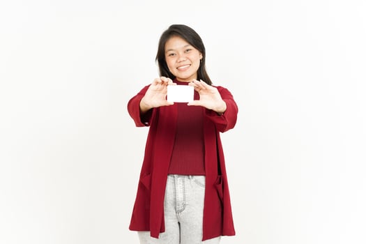 Holding and Showing Blank Credit Card Of Beautiful Asian Woman Wearing Red Shirt Isolated On White photo