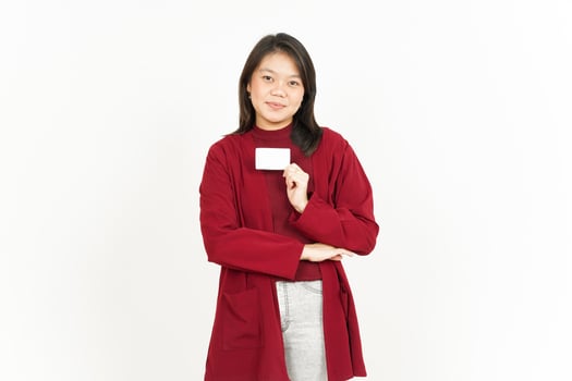 Holding and Showing Blank Credit Card Of Beautiful Asian Woman Wearing Red Shirt Isolated On White photo
