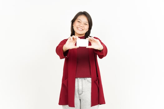 Holding and Showing Blank Credit Card Of Beautiful Asian Woman Wearing Red Shirt Isolated On White photo