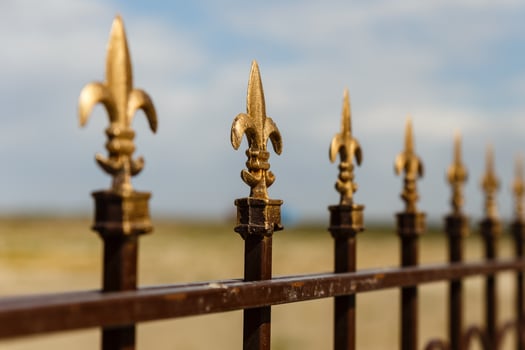 Wrought iron fence with decorative arrows, Decorative fence photo