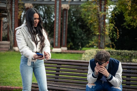 Latin girl yelling at her boyfriend for cheating photo
