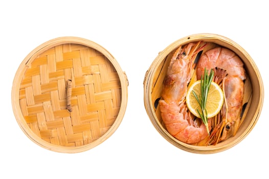 Steamed Red shrimps, Prawns in bamboo steamer isolated on white background. top view photo