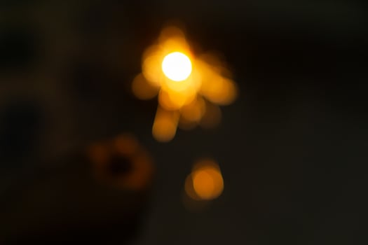 An abstract blurry background of firework in night for new year event photo