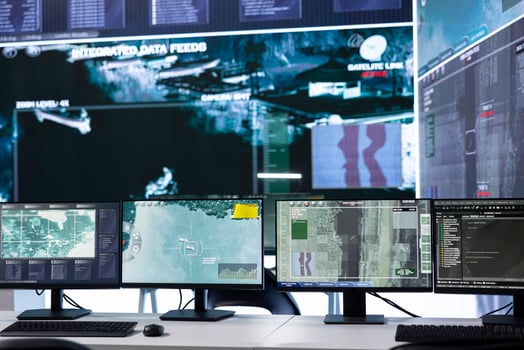 Empty military control center power base with a big screen for reconnaissance and surveillance on a satellite world map. Federal agency intelligence equipment and CCTV radar footage. photo