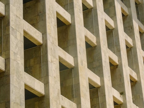 A close up of a building with many windows photo