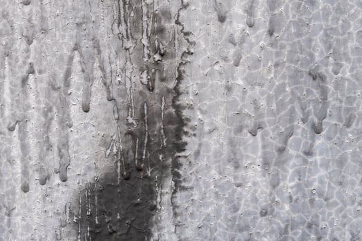Black and gray background or texture. Colored metal wall. photo