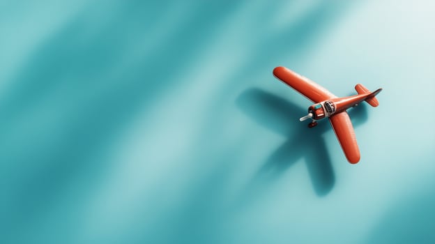 Vintage toy airplane glides over a bright turquoise background, showcasing craft and nostalgia in a playful display photo