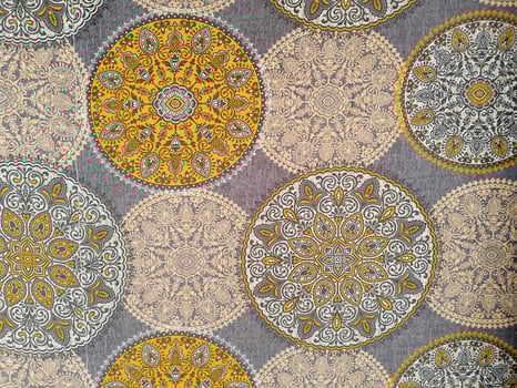 Mandala pattern over fabric closup view photo