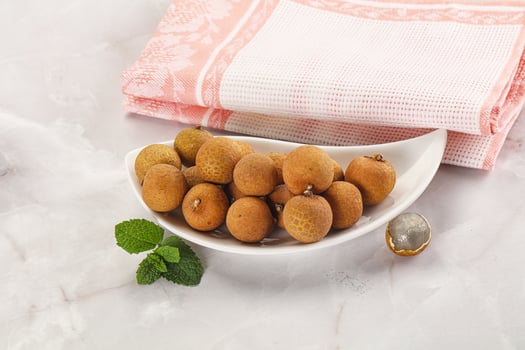 Tropical delicous fruit Longan heap photo