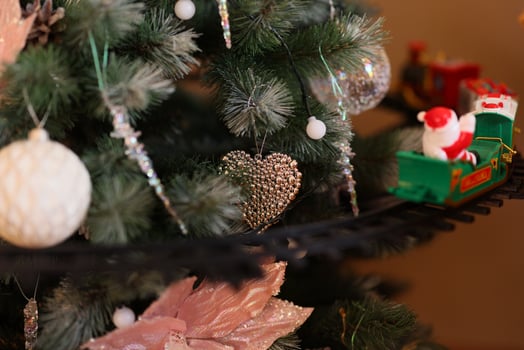 Festive Christmas Tree Decorations adorned with Gifts and Ornaments, creating a joyous atmosphere photo