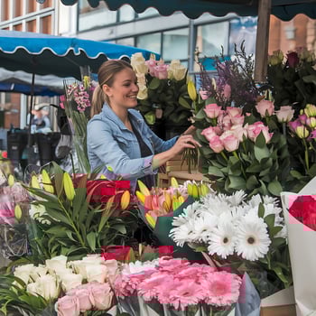 A woman selling flowers photo