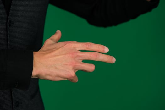 Female hand gestures on green screen. pointing or pressing. photo
