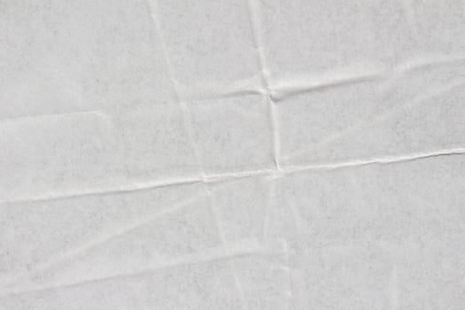 White creased glued poster paper texture background photo