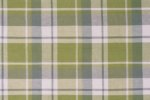 Green and white checkered fabric as a background. photo