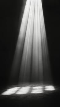 Light rays penetrate darkness creating a serene atmosphere underwater photo