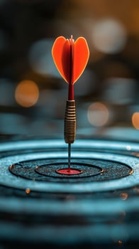 Dart with heart-shaped tip hitting the center of target in a serene blue water background photo