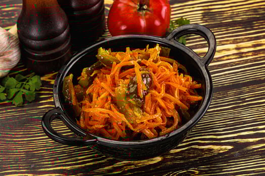 Salad with korean carrot and cucumber photo