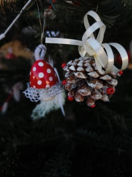 Christmas ornaments hanging on a tree at the budweis christmas market in ceske budejovice, czechia photo