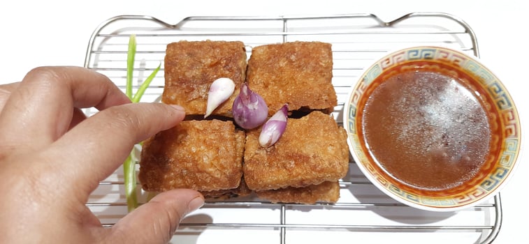 Martabak telur or Martabak telor. Savory pan fried pastry stuffed with egg, meat and spices served with sauce, Indonesian street food photo