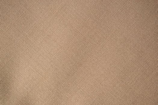 flat view Light brown pattern fabric texture background. photo