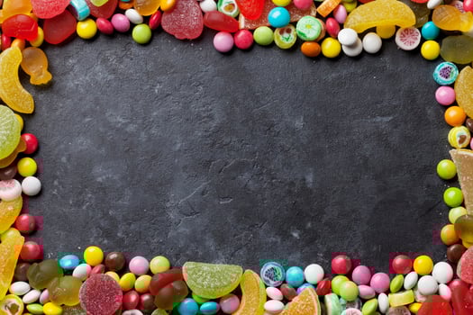 Colorful candies, jelly and marmalade over stone photo
