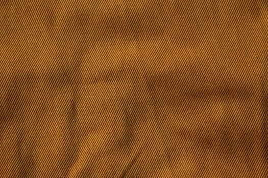 background texture bright brown jeans fabric. photo