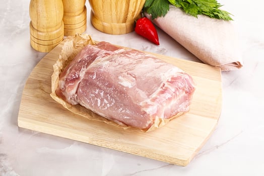 Raw uncooked pork meat loin photo