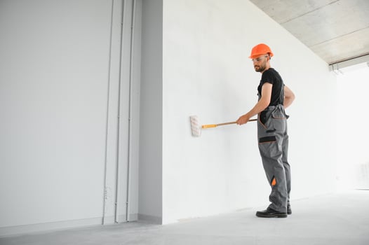Male workers doing interior renovation in apartment. photo