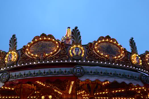 The Enchanting Carousel at Dusk A Dreamy Escape into a World of Whimsy and Delight photo