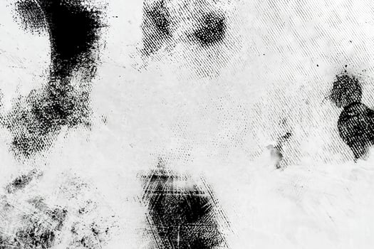Textured abstract black and white grunge design with artistic smudges and patterns for creative projects. photo