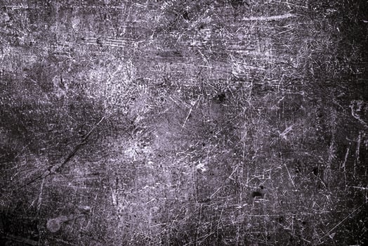 Rough dark grunge surface with prominent scratches and weathered details, perfect for edgy designs and backgrounds. photo