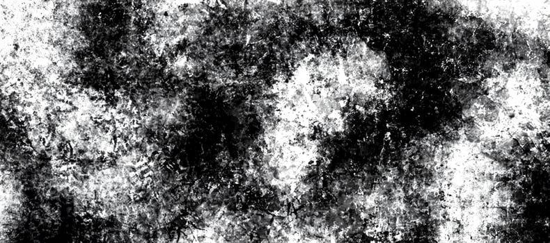 Abstract grunge texture in black and white tones with rough uneven patterns, perfect for design use. photo