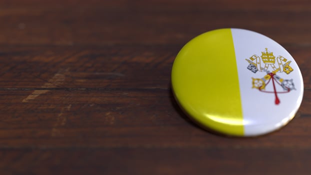 Voting Badge Featuring the Flag of Vatican City photo