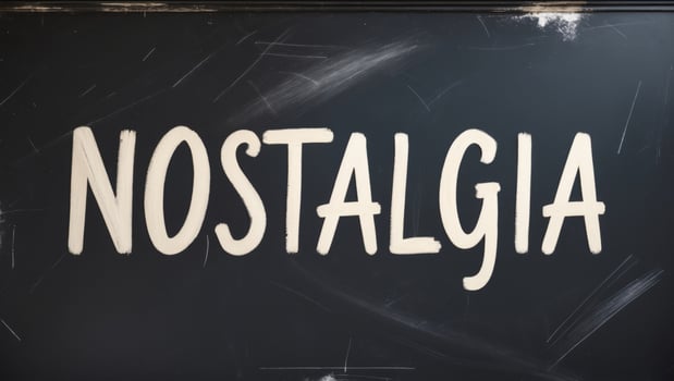 Nostalgia chalkboard emblem written on a blackboard photo