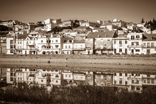 View of city Alcacer do Sal near the river Sado in Portugal photo