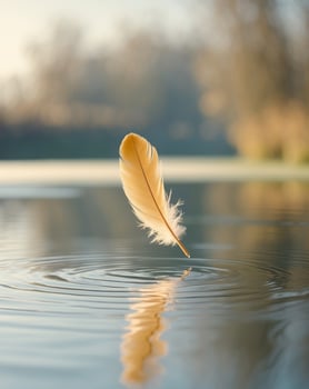 Golden Feather Floating on Calm River Water photo
