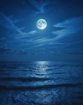 sea view at night Colorful blue sky with clouds and bright full moon photo