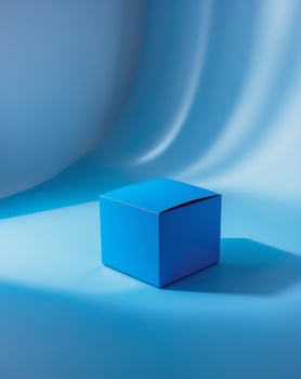 a close up of a blue box on a blue surface photo