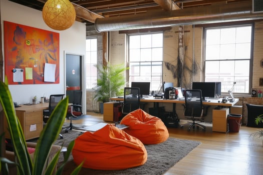 An office with bean bags and a desk photo