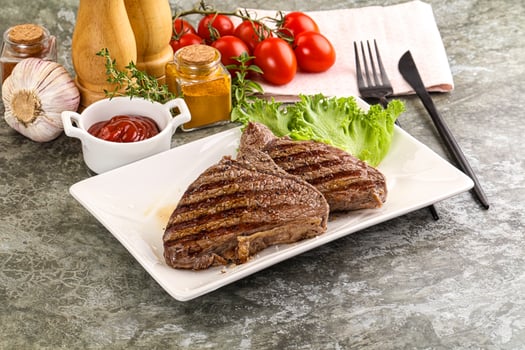 Delicus grilled beef steak with sauce photo