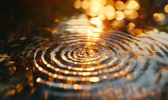 A small circle of water with ripples photo