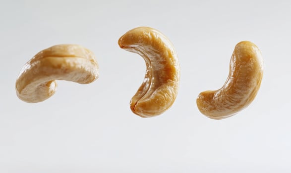 Three cashews are shown in the air photo